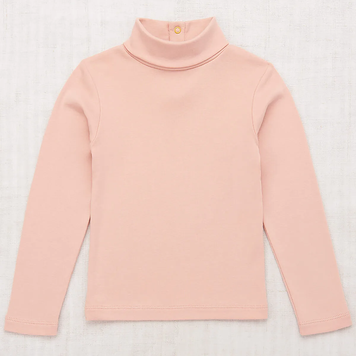Turtleneck in Faded Rose by Misha & Puff